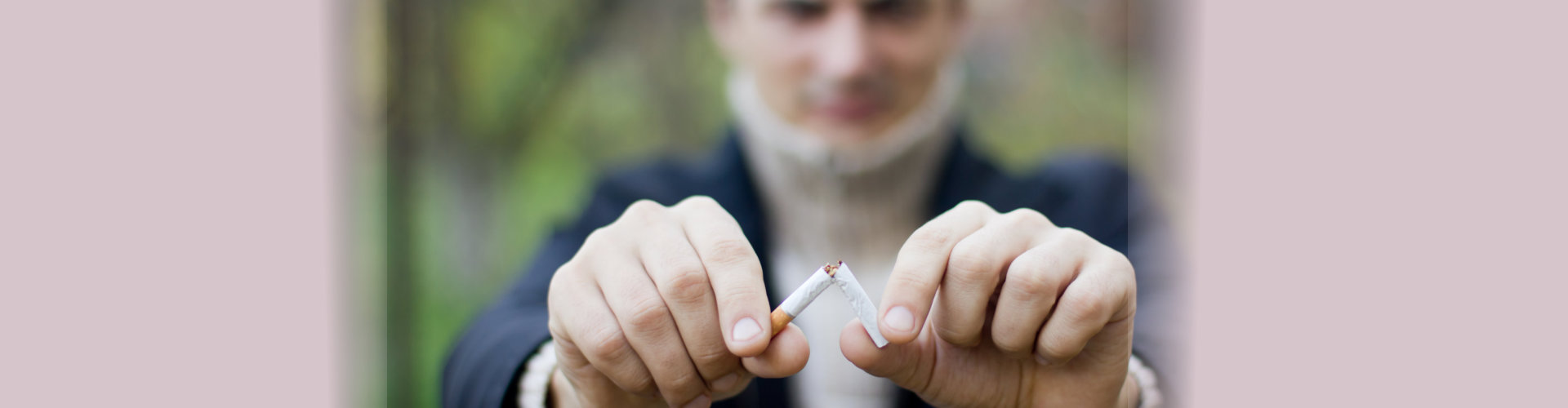 man holding cigarete